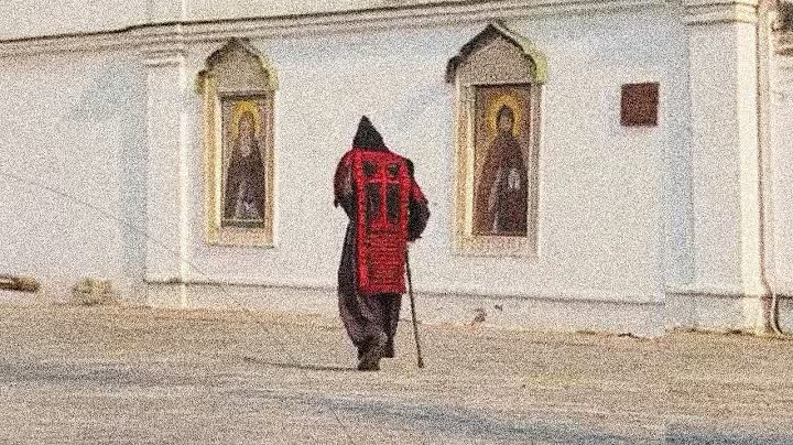 One of harmony's thumbnails. It shows an Orthodox Schemamonk walking next to a church.